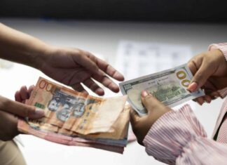 El dólar continúa su depreciación frente al peso y cotiza por debajo de los RD$60